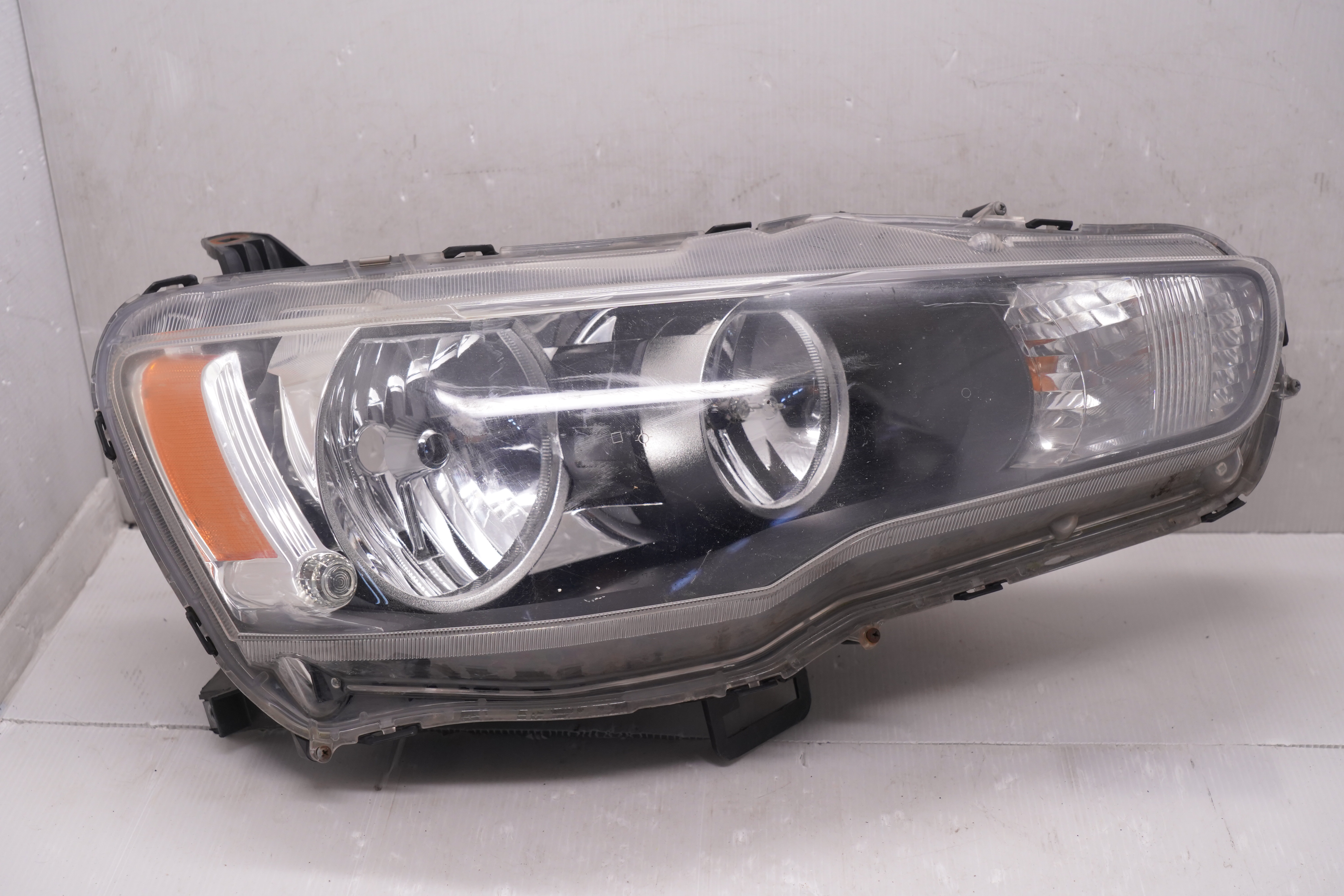 MITSUBISHI LANCER 2008-2018 HALOGEN R.H.S HEADLIGHT GENUINE