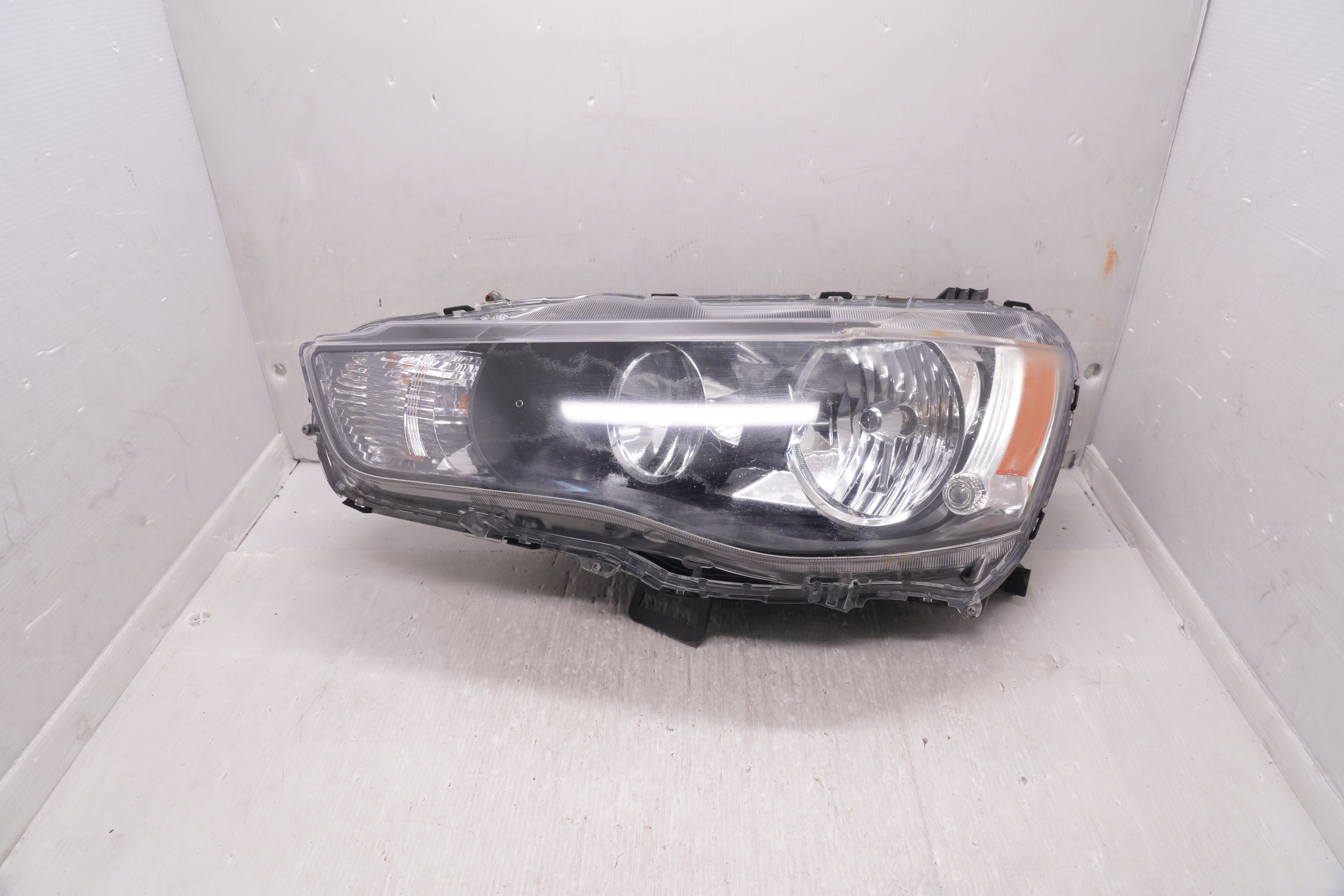 MITSUBISHI LANCER 2008-2018 HALOGEN L.H.S HEADLIGHT GENUINE