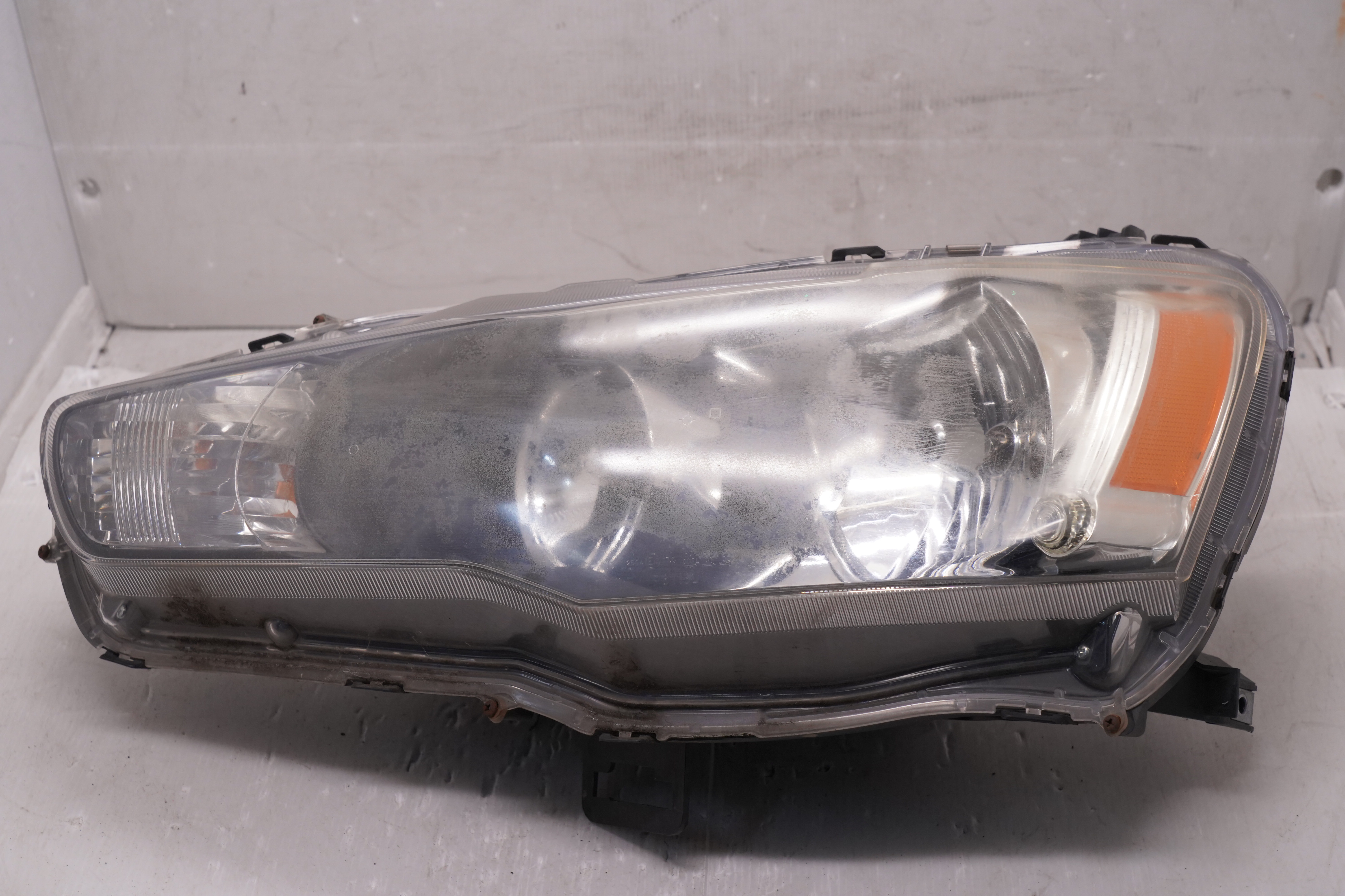MITSUBISHI LANCER 2008-2018 HALOGEN L.H.S HEADLIGHT GENUINE