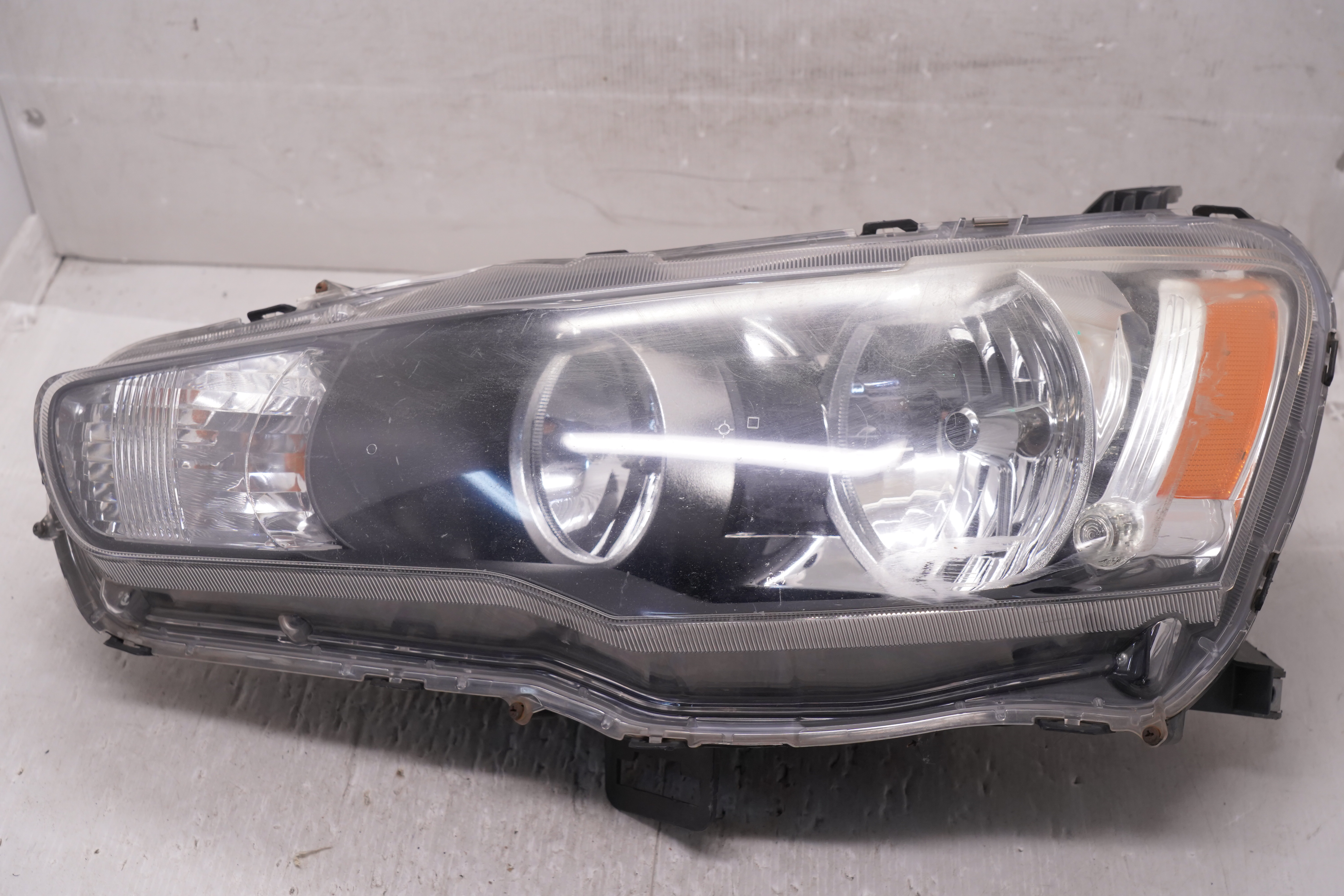 MITSUBISHI LANCER 2008-2018 HALOGEN L.H.S HEADLIGHT GENUINE